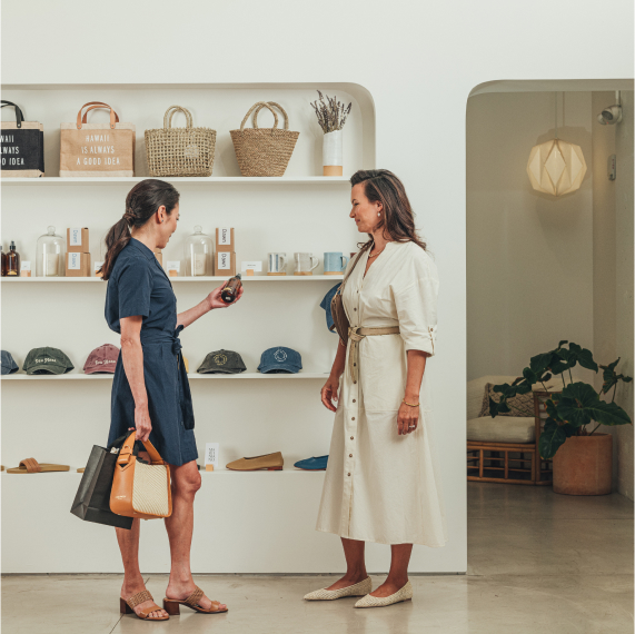 Two women in retail store